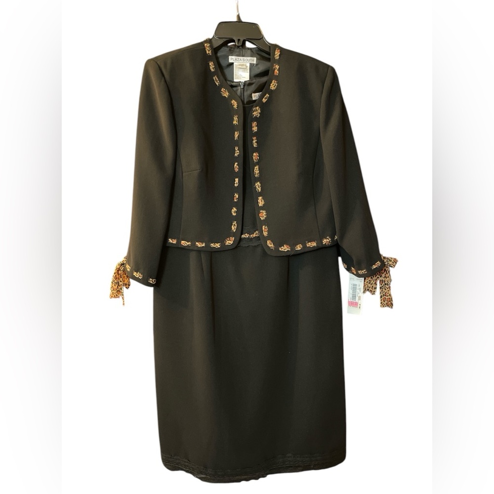 Plaza South, black dress with coat. Leopard print accents.